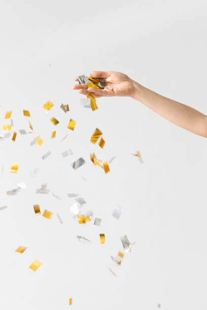istock A Hand Holding Confetti 1183120172