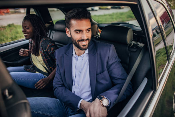 istock Businessman driving in the car 1183124784