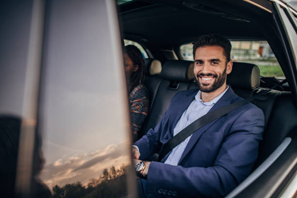 istock Businessman driving in the car 1183124859