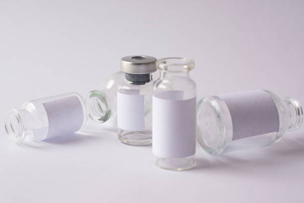 istock Empty glass medical vials closeup. 1183126015