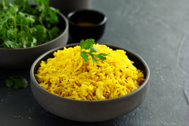 istock Vegetarian rice with curry and cashew nuts. 1183127390