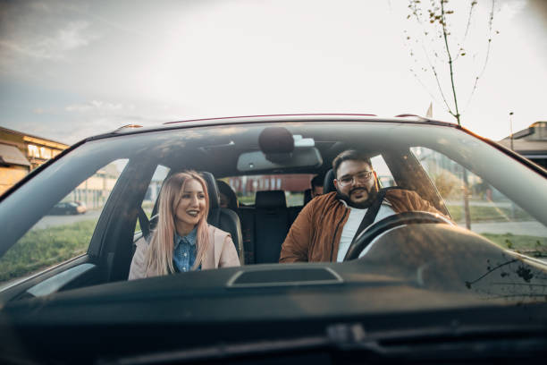 istock Friends riding in a car together 1183127418