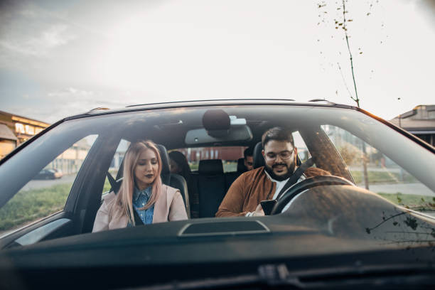 istock Friends riding in a car together 1183127551