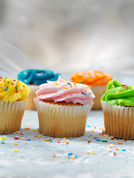 istock Colorful Cupcakes with Candy Sprinkles 1183135394
