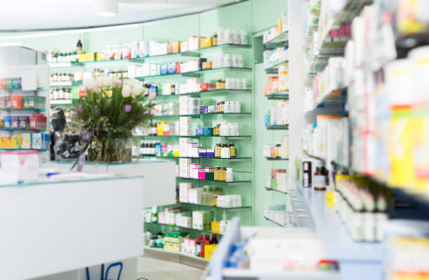 istock Different medicines on the shelves in the pharmaceutical  store 1183135584
