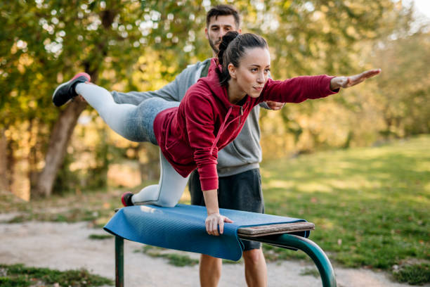 istock Young caucasian couple exercising by the river 1183138852