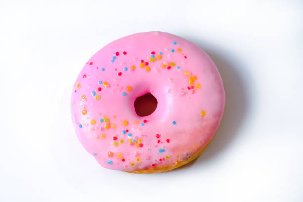 istock Delicious colorful donuts on white background. 1183139659