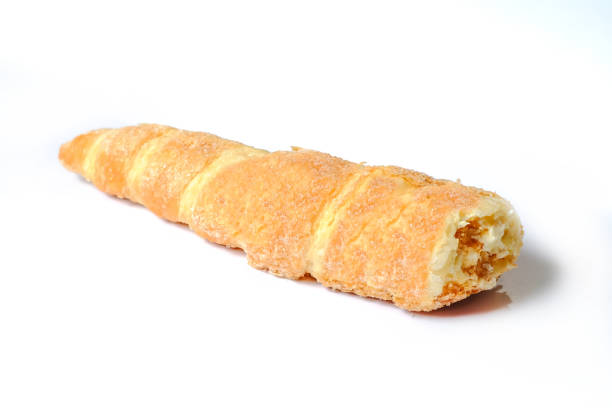 istock sweet breads cream roll on white background. 1183139700