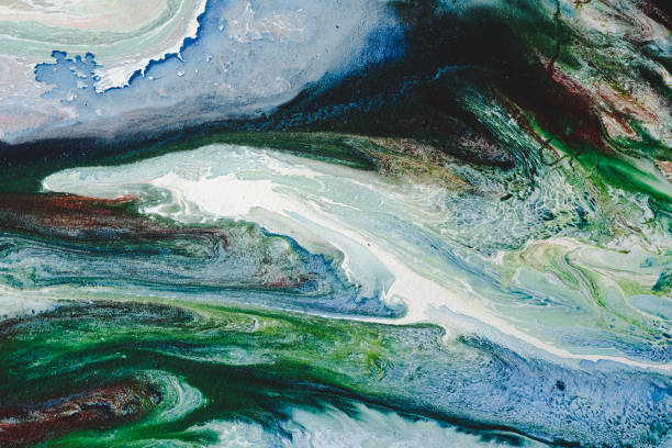 istock Abstract Oil color paint splatter on ground. 1183141748
