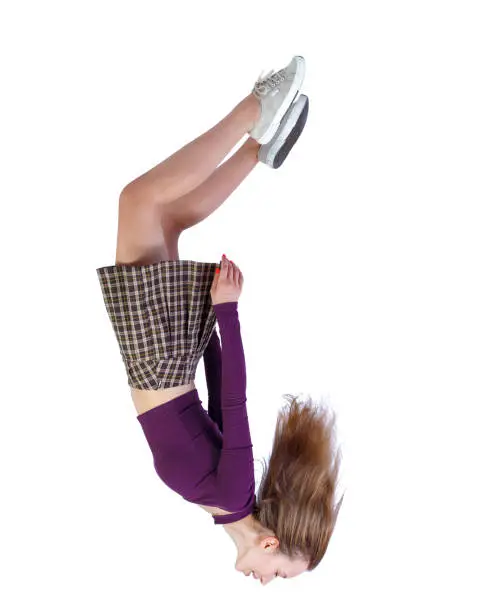 Photo of Side view of woman in zero gravity or a fall.