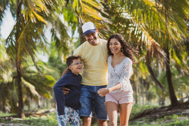 istock Father walking with his children 1183142351