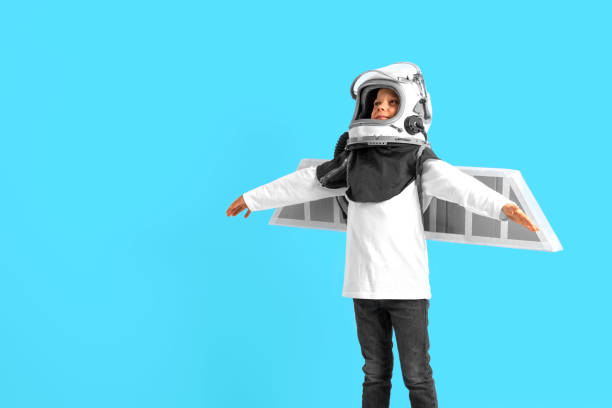 Young guy fancies himself donning BY PLANE PILOT HELMET