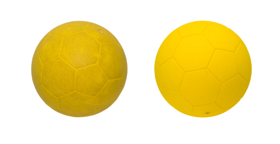 Yellow ball, clean and dirty, isolated on white