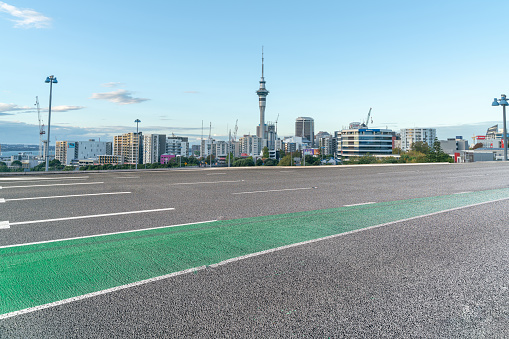 empty road track with auckland city sunset