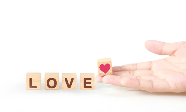 istock Concept creative idea and innovation. wooden cube block in hand 1183147838