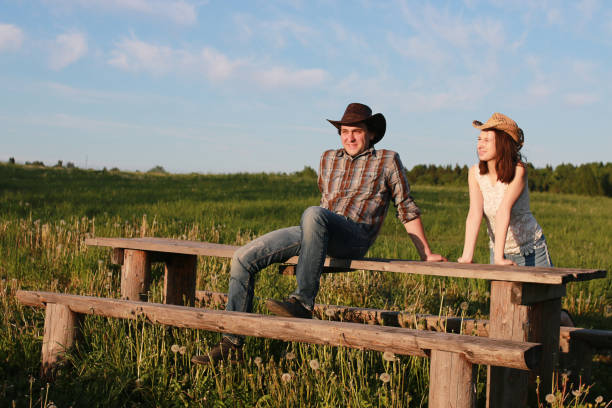 istock Cute couple on a walk by the countryside 1183148989