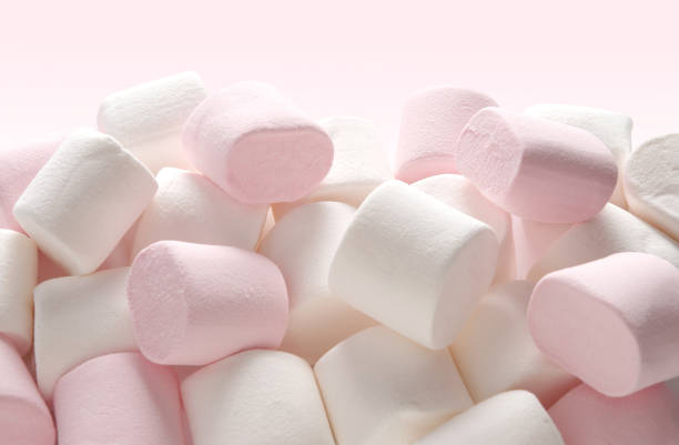istock Heap of pink and white marshmallow sweets 1183149374