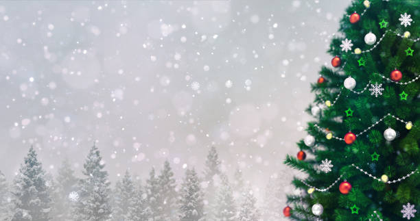 istock Decorated Christmas tree in winter snowy forest at snowfall, right side closeup 1183149560