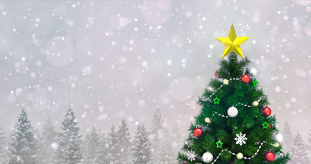istock Decorated Christmas tree in winter snowy forest at snowfall, top tree closeup view 1183149572