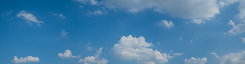 Clouds at sunset before rain blue sky white and grey clouds Panoramic