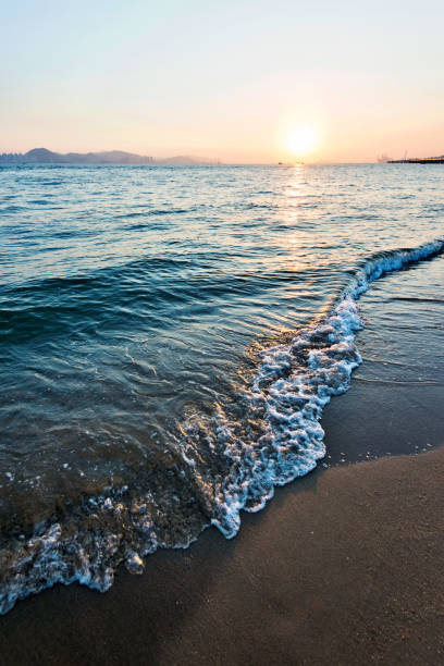 istock Beautiful beach under the sunset 1183151546