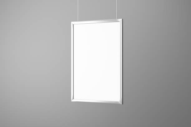 istock Vertical Poster Mockup metal hanging rope isolated gray background. 3D rendering 1183151965