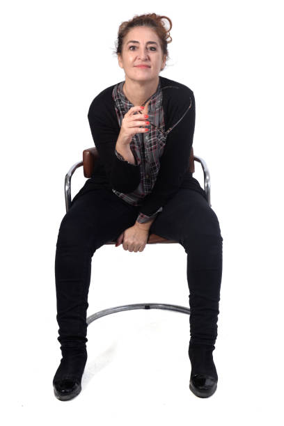 istock woman sitting on a chair on white background 1183154458