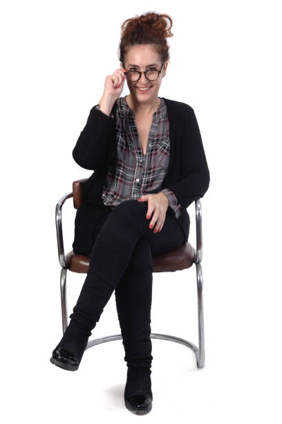 istock woman sitting on a chair on white background 1183155141