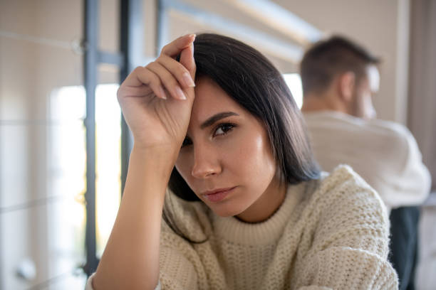istock Wife having headache after disagreement with husband 1183156426