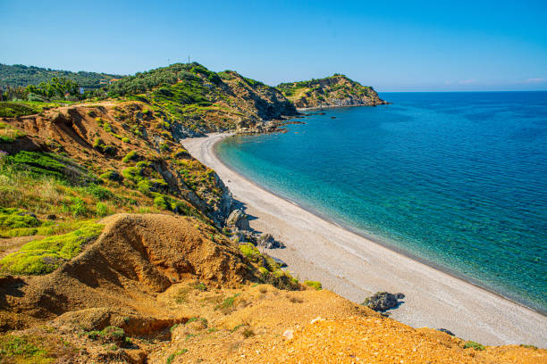 Sea and the pebbled beach in Skiathos, Greece