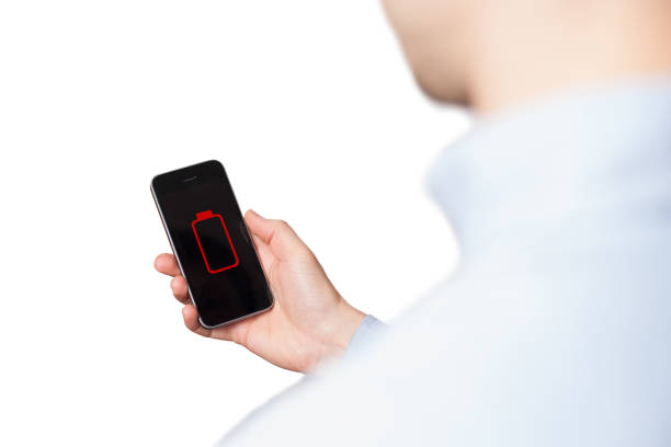 istock Close up man hands using smart phone battery low charged battery screen. White background 1183159957
