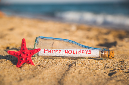 Happy Holidays message in a bottle.