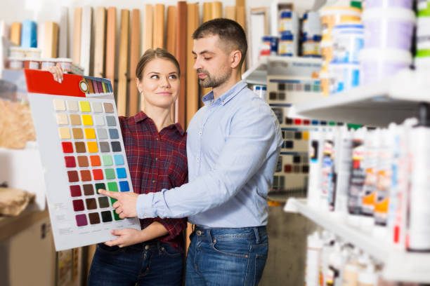 istock couple is choosing color for materials with pallete 1183160286