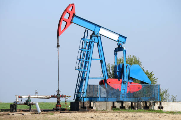 istock Pump jack on field oil and gas industry 1183161073