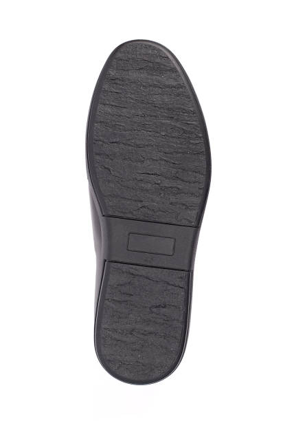 istock Black shoe sole isolated on a white background. 1183161684