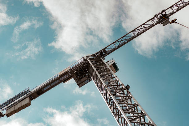 Huge yellow crane with a cloudy background. stock photo