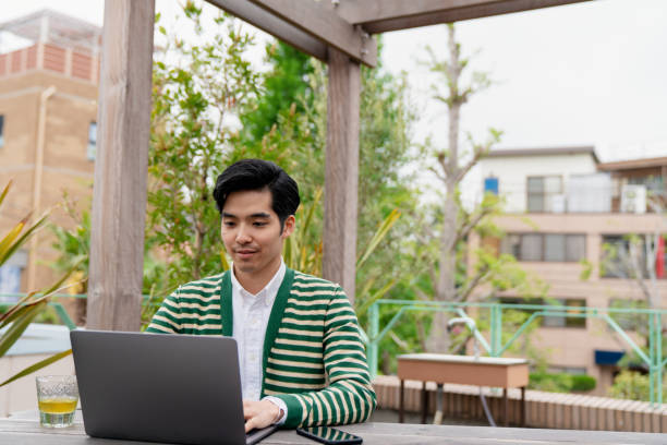 istock Confident young man working outdoors 1183163222