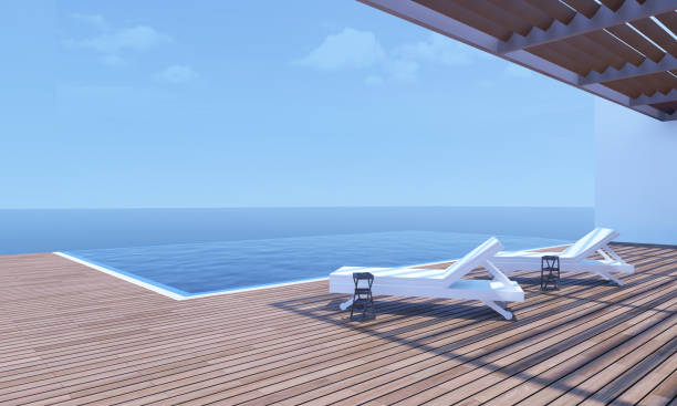 istock 3D image from an house with pool, sun beds at side of. 1183163605