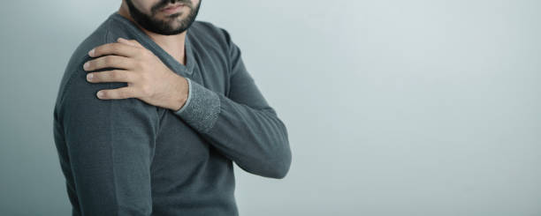 istock shoulder pain; medical concept, front view 1183164458