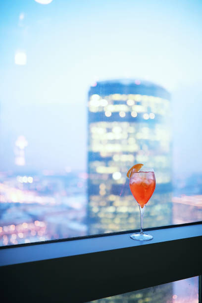 istock Cocktail glasses on the windowsill by the glass 1183165179