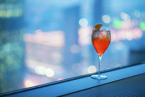 istock Cocktail glasses on the windowsill by the glass 1183165241