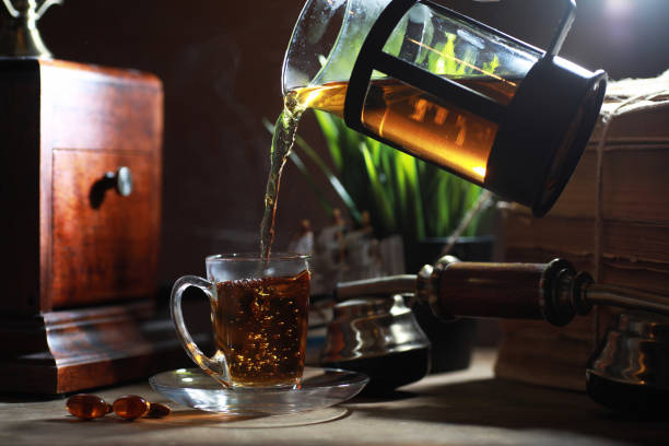 istock Brewing tea on a wooden table 1183165876