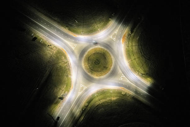 istock Car moving on roundabout 1183177386
