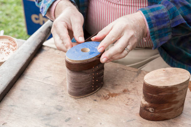 istock Working Hands -- An Artist Making Wooden Boxes the Old Fashioned Way 1183180177