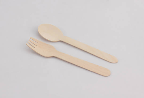 istock kitchenware set of wooden spoon and fork isolated on white 1183180547