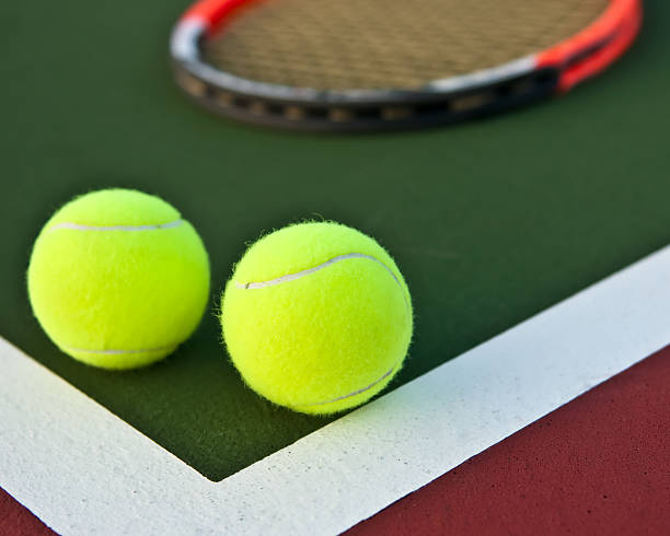 istock tennis ball and racket 118318124