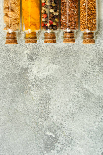 istock spices, many different types, textures (peas, red pepper, black pepper, turmeric, mountain salt, chia seeds, mustard and much more) menu concept. food background. copy space. Top view 1183182382
