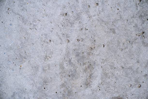 istock Old grey concrete wall grunge texture background close up 1183182732