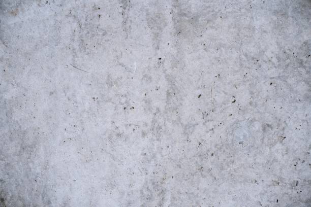 istock Old grey concrete wall grunge texture background close up 1183182741