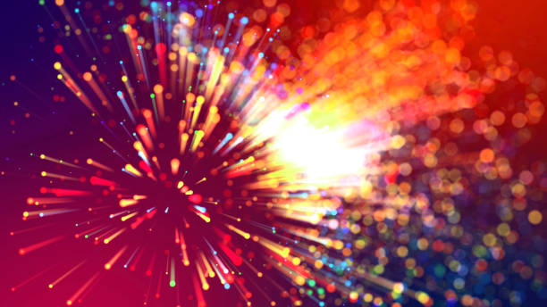 istock Abstract explosion of multicolored shiny particles or light rays like laser show. 3d render abstract beautiful background with light rays colorful glowing particles, depth of field, bokeh. 1183184992